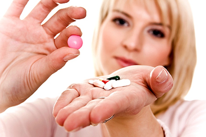 Young women with tablets in hand