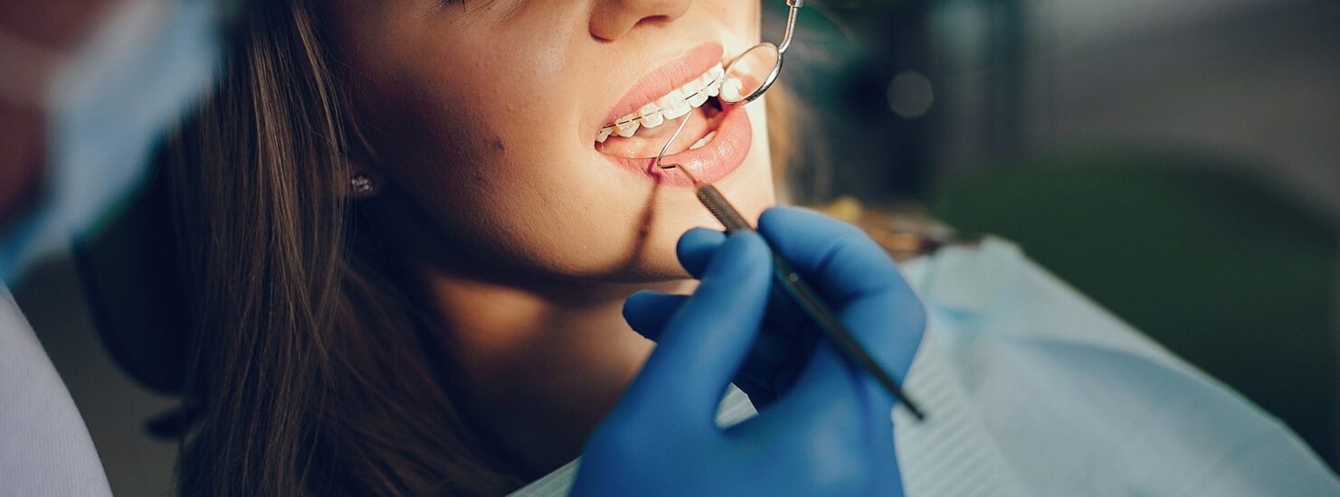 beautiful-girl-sitting-office-dentis